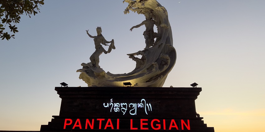 Statue at Legian Beach in Bali with Patnai Legion written in Indonesian and English, one of the famous places to visit in Kuta.