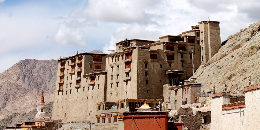 Picturesque view of Leh Palace in the morning with beautiful clouds and blue sky