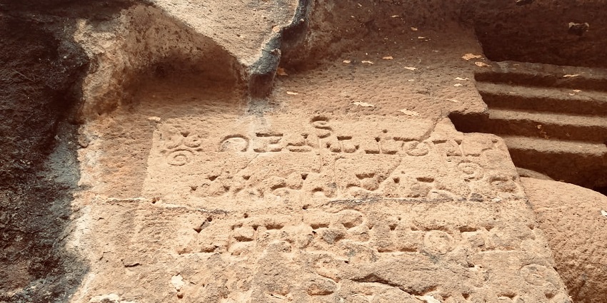 An image showing Intricate inscriptions in Lenyadri Caves, showcasing ancient artistry and history