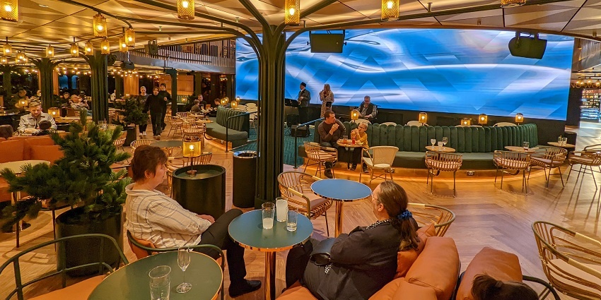 People chilling and enjoying the music at a lounge with their family and friends