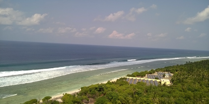 Clear view of the ocean and the golden sandy beach of the Lakshadweep