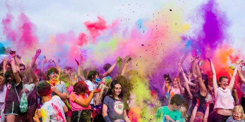 A picture of vibrant scenes from local festivals showcasing the Tamil culture.