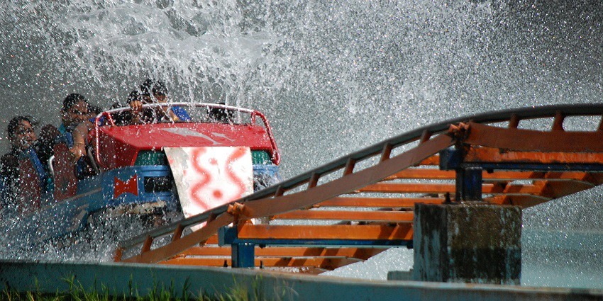 A view of excited riders on a water ride splashing through waves at Ramuji water park Jabalpur.