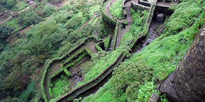 An aerial view of Gumtara Fort from a distance, amid lush greenery and landscapes