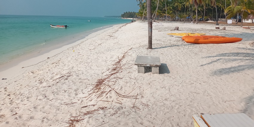 Image of beautiful lagoon beach with spotless white fine grained sand. Excellent for swimming