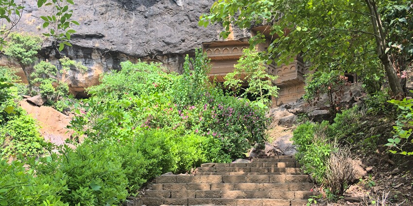 Entrance to the Kondana Caves featuring intricate rock-cut architecture