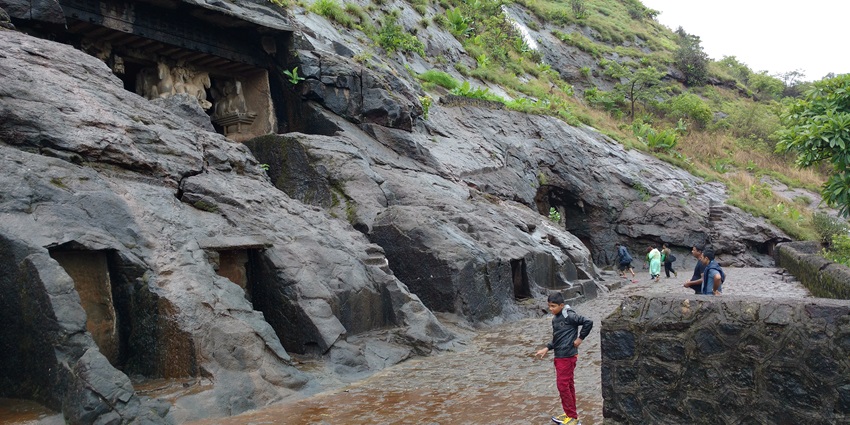 An image of the rocky front of Bedse Caves, a famous cave in Maharashtra.