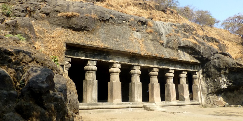 Majestic cave cut amidst rocks, set in a breathtaking landscape
