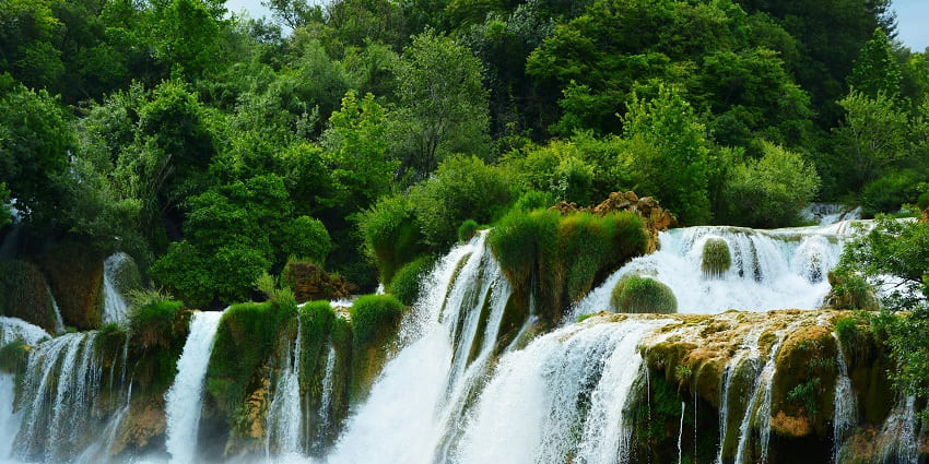 A breathtaking landscape justifying the serene location of Amirthi Zoological Waterfalls.