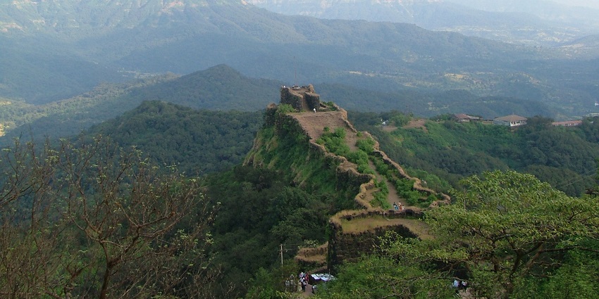 Bankot Fort, featuring its ancient walls and scenic landscape of the Deccan