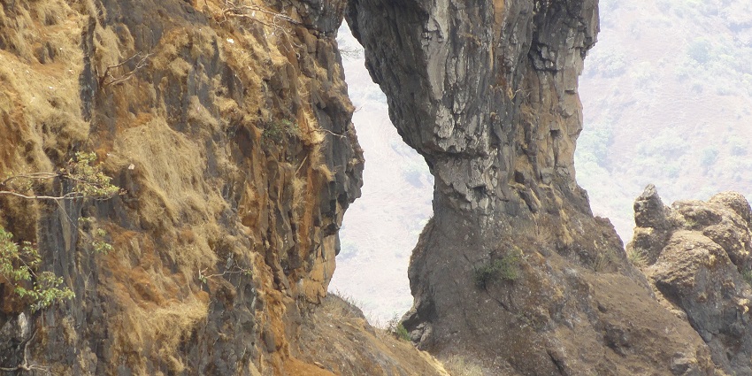 View from Needle Hole Point in Mahabaleshwar, showcasing lush green landscapes