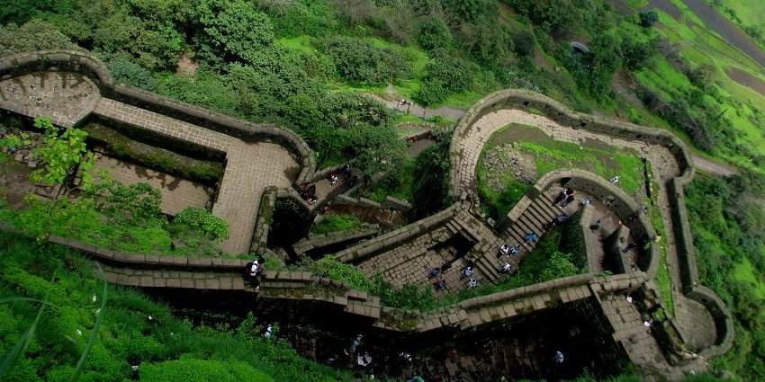 Image showcasing lush greenery and unique design of the Lohagad Fort in Maharashtra.