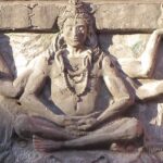 A picture of a wall sculpture of Lord Shiva outside the Loknath Temple in Haryana