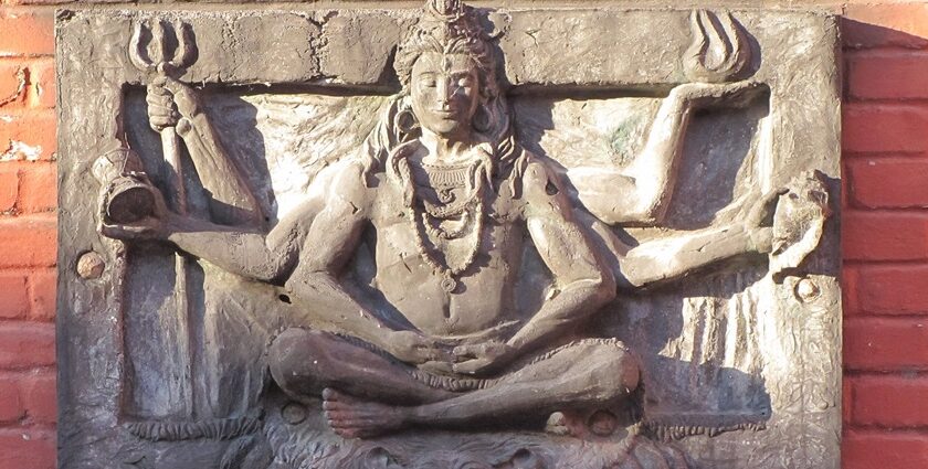 A picture of a wall sculpture of Lord Shiva outside the Loknath Temple in Haryana