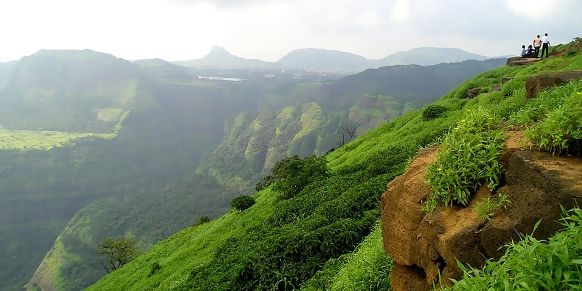 The image depicts a panoramic view of Lonavala, a scenic hill station in India