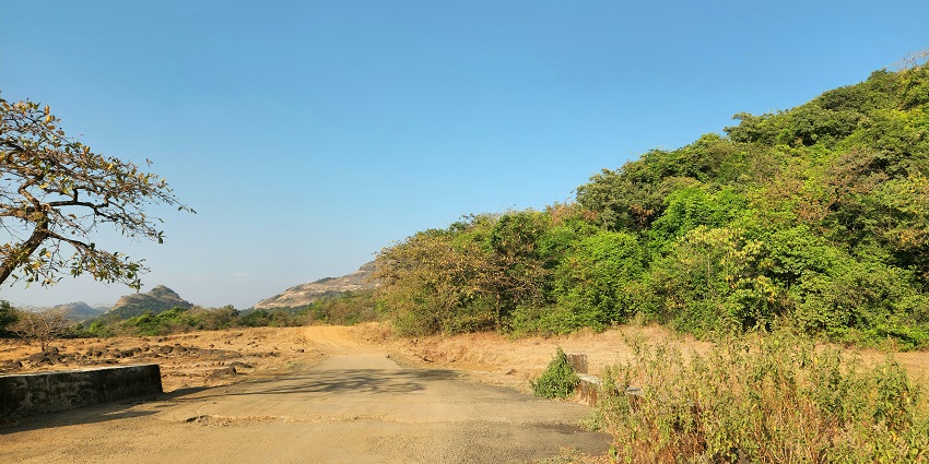 View of hills covered in greenery and rustic terrains in Lonavala, Maharashtra, India.