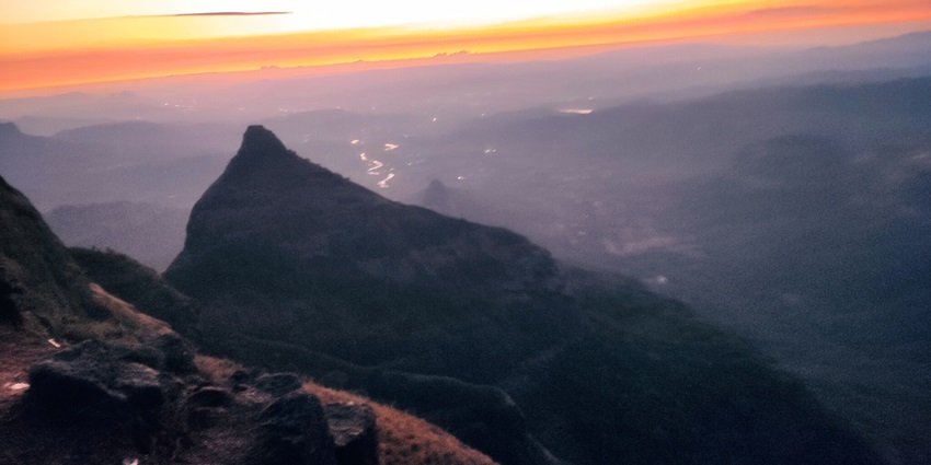 Sunset view from Tiger Point, Lonavala, with a view of the valley.