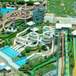 An aerial view of one of the large Lonavala water parks featuring high water slides.