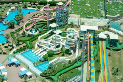 An aerial view of one of the large Lonavala water parks featuring high water slides.