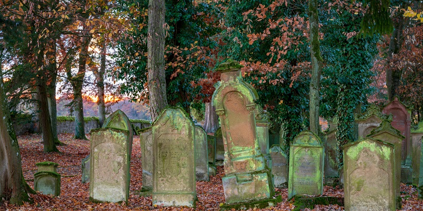 A picture of Loosenough Cemetery which looks very becomes very scary as it gets darker.