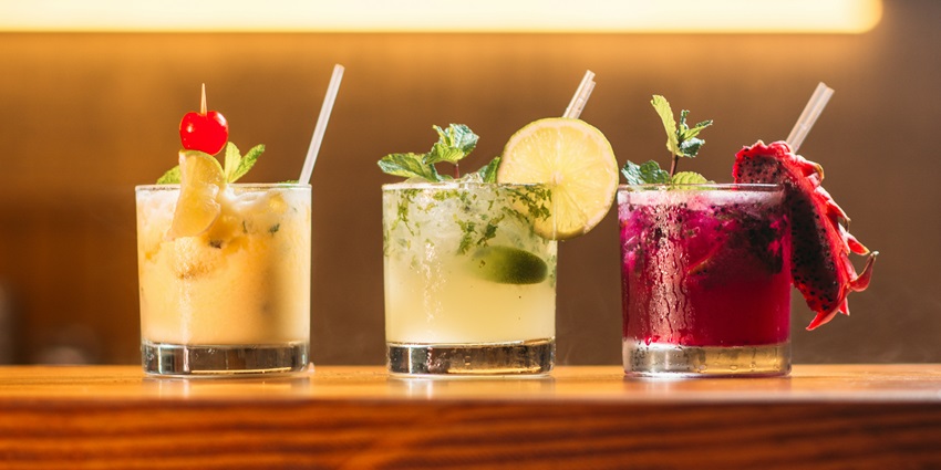 A picture of various cocktail drinks placed on a bar counter at a party place in Candolim