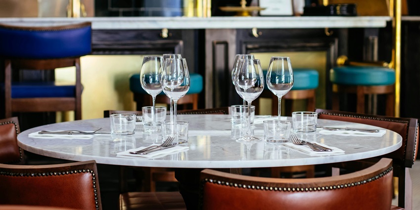 M Bar Kitchen and Cocktails offers an industry-themed- themed lounge for parties.
