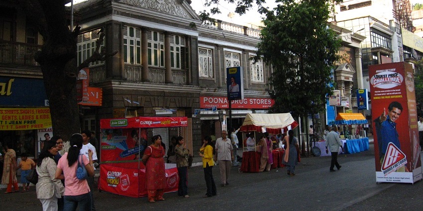 An image of MG Road: Lively street showcasing Pune's nightlife and dining culture.
