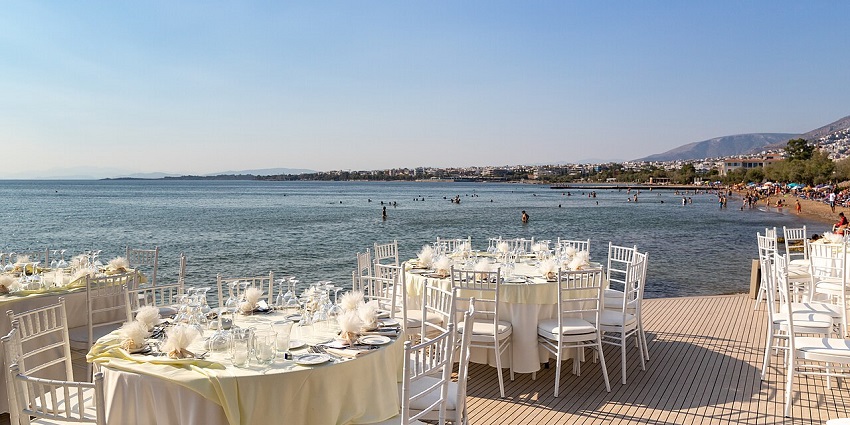 Image of dinner tables across Madh Island Beach looking over the beautiful ocean