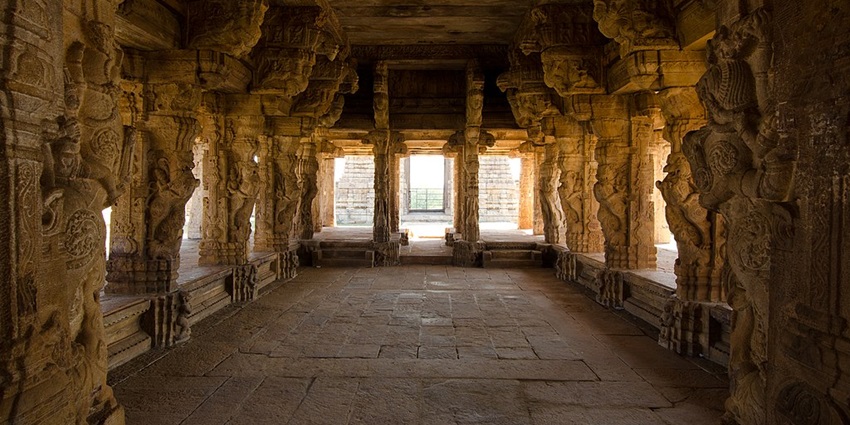 The image shows the historic structure of the temple, surrounded by a peaceful environment.