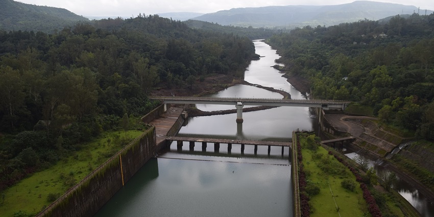 Scenic view of Madhuban Dam, Peaceful and relaxing atmosphere, Well-maintained garden.