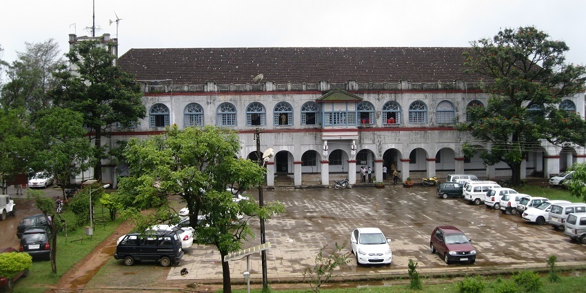 Madikeri Fort’s architecture reflects its history and cultural significance amid greenery.