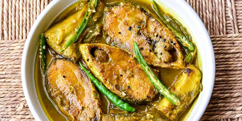 The best street food in madurai is tangy fish curry from Madurai, served with rice.