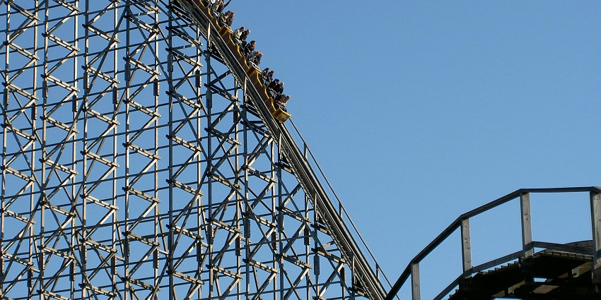 Thrilling roller coaster ride, filled with excitement and joy as it twists and turns.