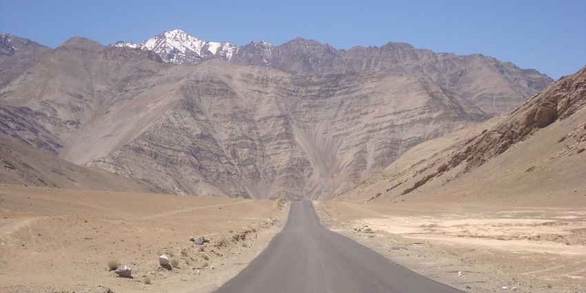 Scenic view of Magnetic Hill in Ladakh, showcasing the optical illusion where vehicles appear to roll uphill