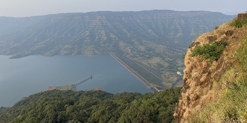An aerial view of Mahabaleshwar from the top of the hill, surrounded by greenery