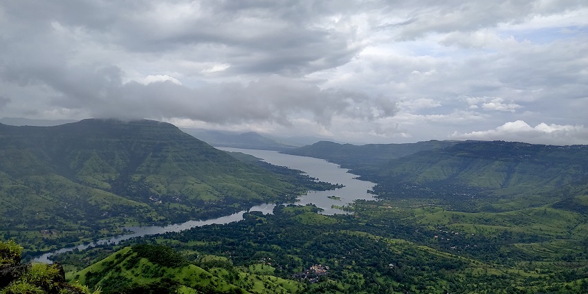 Misty landscapes, evergreen forests, and strawberry farms in Mahabaleshwar.