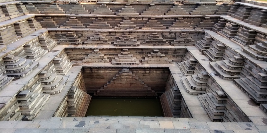 The deep pushkarini can be found at Mahanavami Dibba, Hospet.