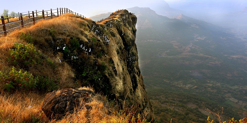 Majestic view of Mahuli Fort nestled amidst lush green mountains offering scenic views