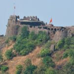 Mahur Fort, a historic tourist attraction in Maharashtra, surrounded by lush green hills