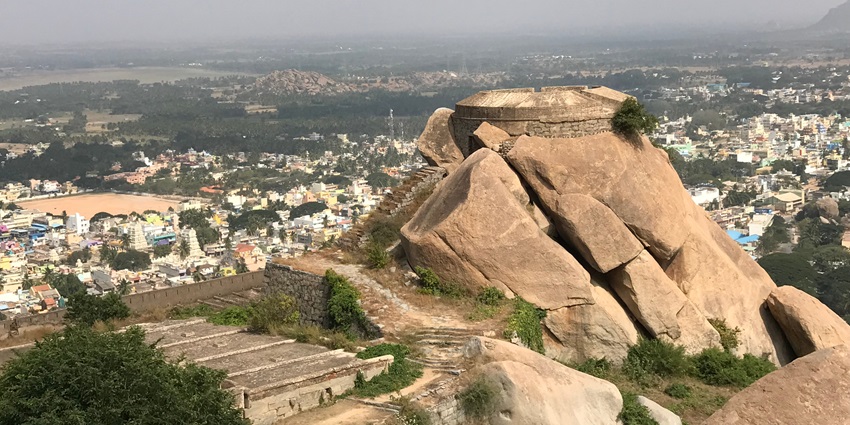 Image of Makalidurga Fort around the picturesque mountains view under clear blue sky
