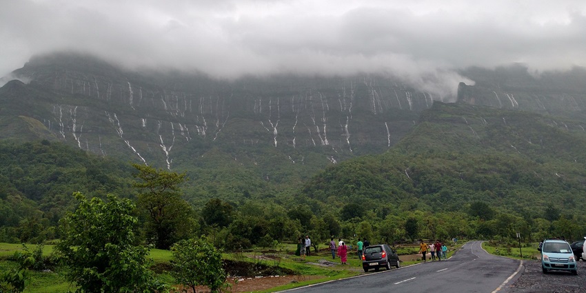 Malshej Ghat, the stunning mountain pass, lush landscapes, and waterfalls.