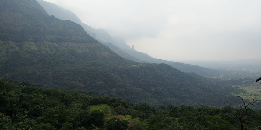 A top view of Malshej ghat with dense vegetation, a famous place near Thanale Caves.