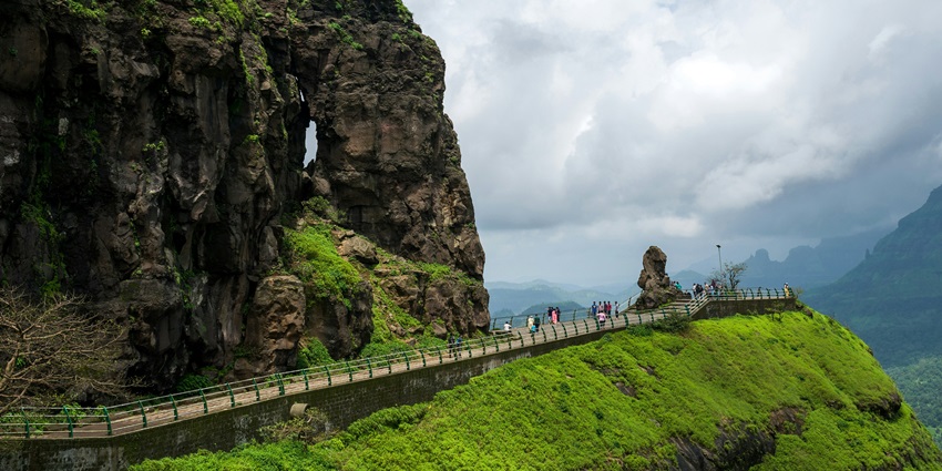 A scenic view of Malshej Ghat, one of the top hill stations near Mumbai to visit in May.