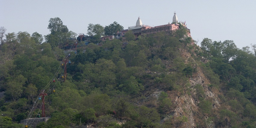 Sacred temple dedicated to Goddess Manasa, surrounded by nature