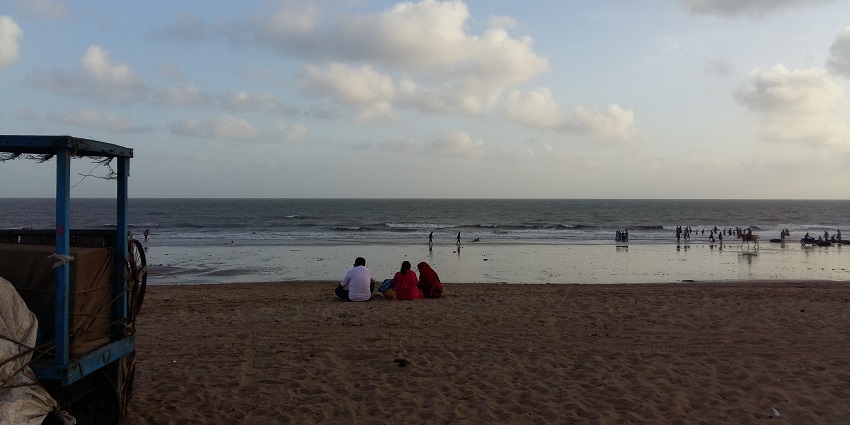 Enchanting evening at Mandvi Beach, with vibrant hues painting the sky.