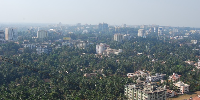 A picture of the vibrant skyline of Mangalore offering views of greenery and buildings