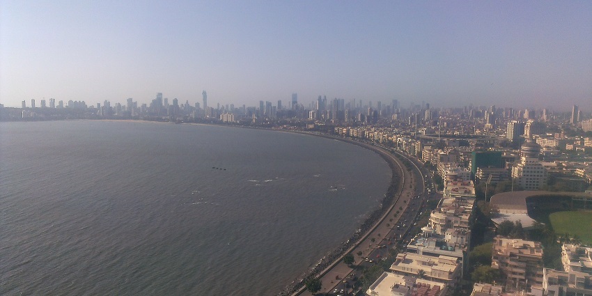 Marine Drive in Mumbai, highlighting the beautiful coastline, and vibrant atmosphere.