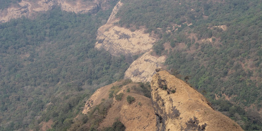 The iconic Duke's Nose Peak offers opportunities for thrilling trekking and photography.