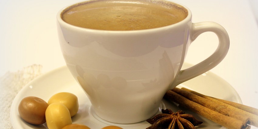 Spiced tea infused with aromatic herbs and robust flavors