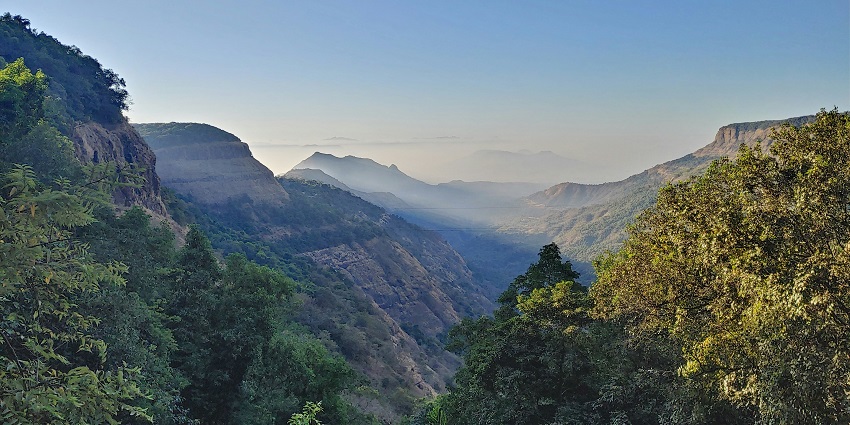 Panoramic view from Monkey Point in Matheran, showcasing the surrounding hills and valley.